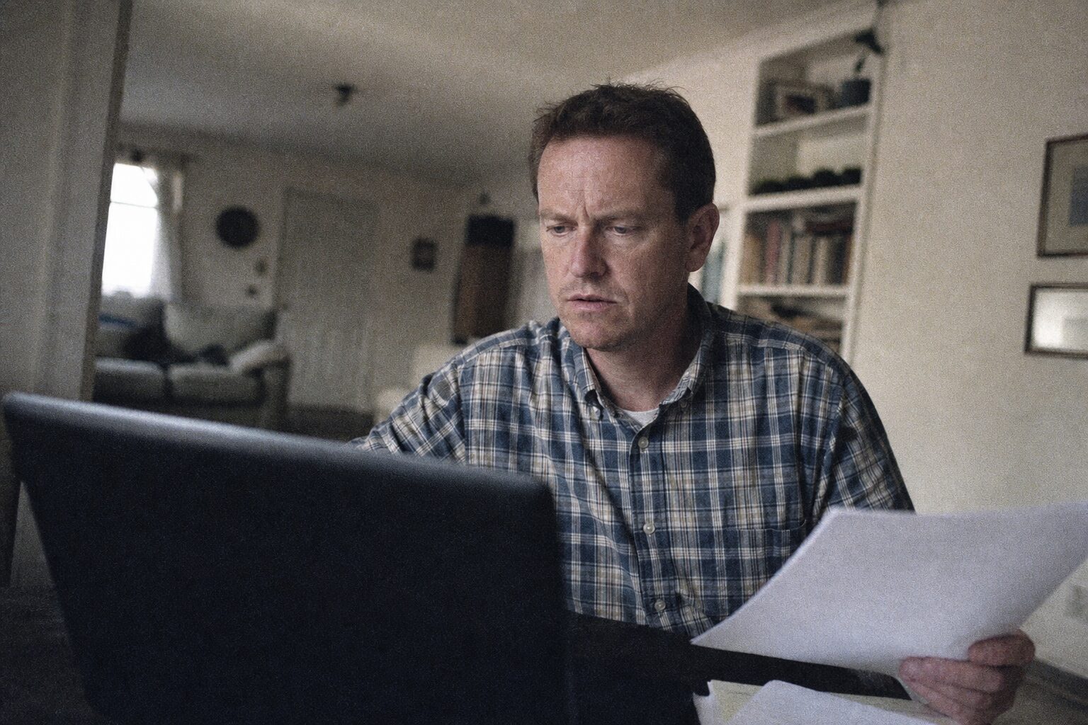 Two men talking over a video call