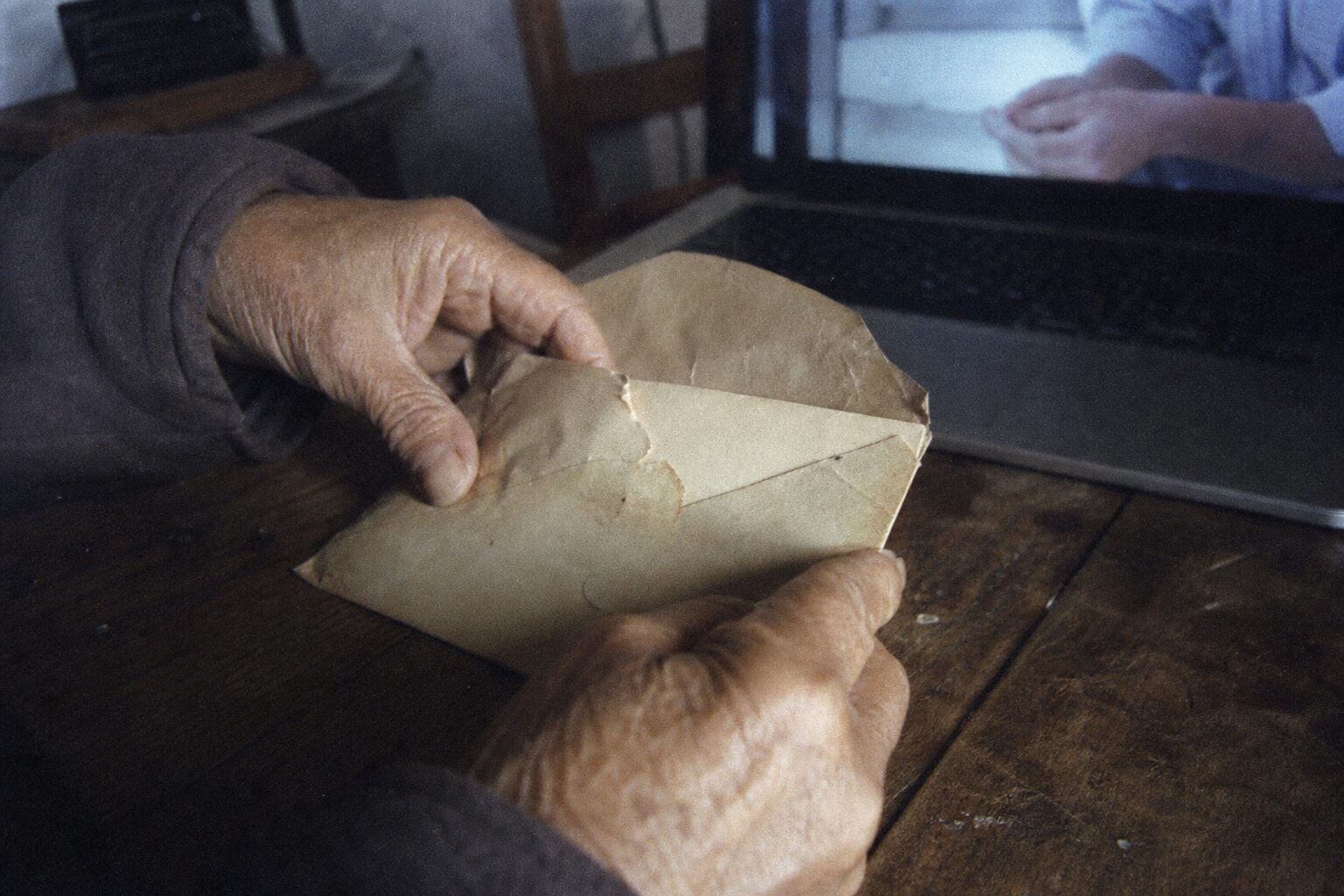An old sealed envelope inscribed 'Open when the time comes'