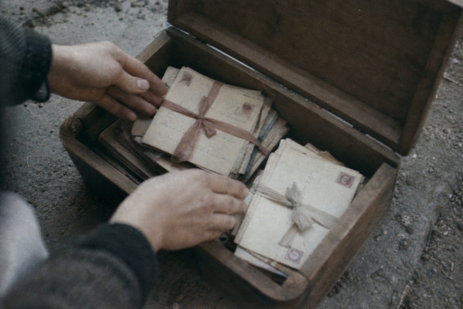 A bundle of unsent letters found inside a wooden box